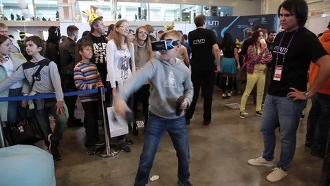 Boy uses virtual reality game development kit, virtual reality glasses Stock-Footage 80897681