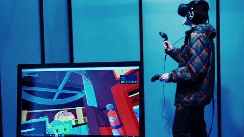 Boy uses a virtual reality glasses at the comics. Rome, Italy. April 2017 動画素材 74516300