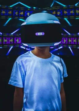 The boy uses a virtual reality headset Stock Photos