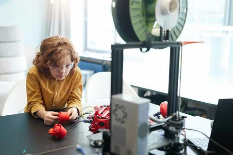 Boy Using 3D Printer at School Stock Photos
