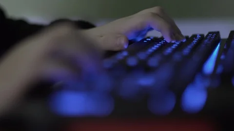 Boy Using Computer Keyboard Rack Focus Video stock 103596715