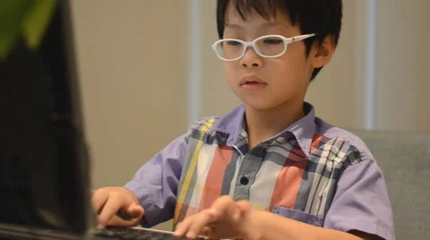 Boy using desktop computer Stock Footage 52914056