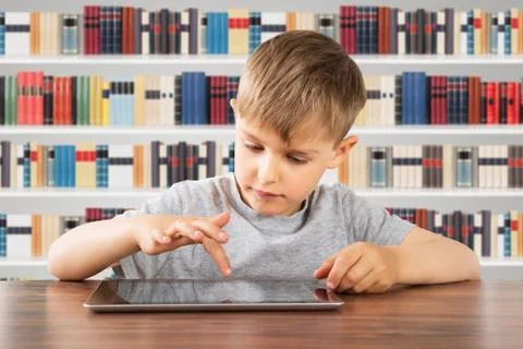 Boy Using Digital Tablet At School 스톡 사진