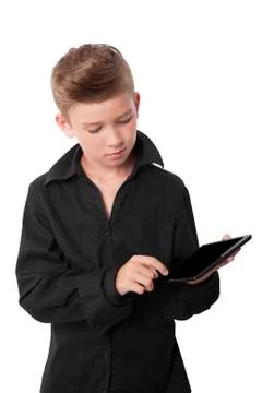 Boy using his tablet. Stock Photos
