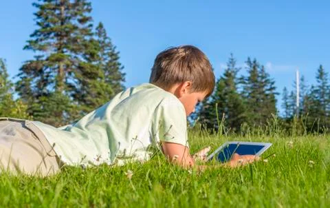 Boy using ipad Stock Photos