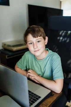 Boy using laptop Stock Photos