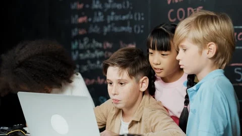 Boy using laptop programing engineering code and writing program. Erudition. Stock Footage 261873392
