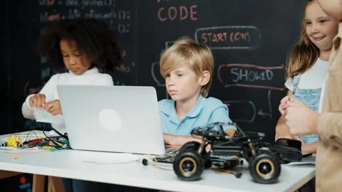 Boy using laptop programing engineering code and writing program. Erudition. Stock Footage 264208814