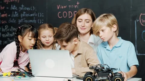 Boy using laptop programing engineering code and writing program. Erudition. Stock Footage 264545967
