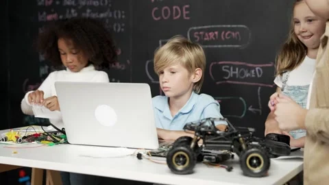 Boy using laptop programing engineering code and writing program. Erudition. Stock Footage 274743390
