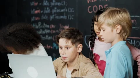 Boy using laptop programing engineering code and writing program. Erudition. Stock Footage 275719812