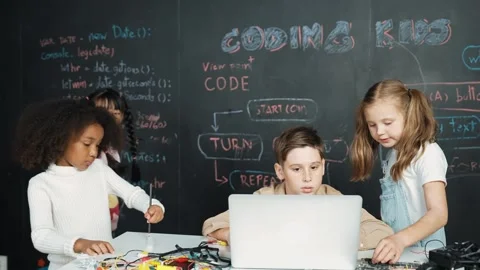 Boy using laptop programing engineering code and writing program. Erudition. Stock Footage 276229412