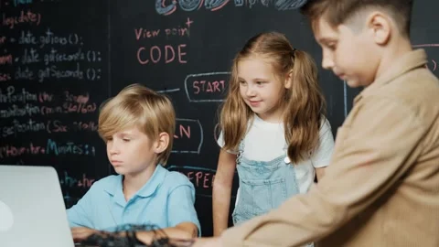 Boy using laptop programing engineering code and writing program. Erudition. Stock Footage 278484099