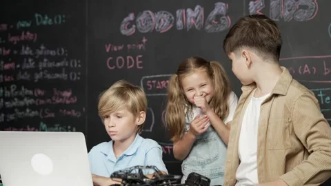 Boy using laptop programing engineering code and writing program. Erudition. Stock Footage 279939629