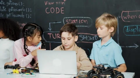 Boy using laptop programing engineering code and writing program. Erudition. Stock Footage 281437195