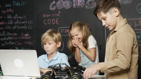 Boy using laptop programing engineering code and writing program. Erudition. Foto stock