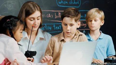 Boy using laptop programing engineering code and writing program. Erudition. Foto stock