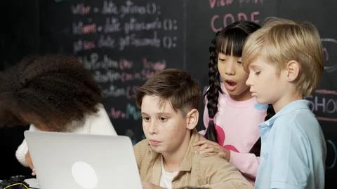 Boy using laptop programing engineering code and writing program. Erudition. Foto stock
