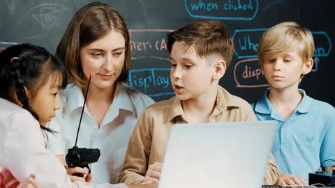 Boy using laptop programing engineering code and writing program. Erudition. Foto stock