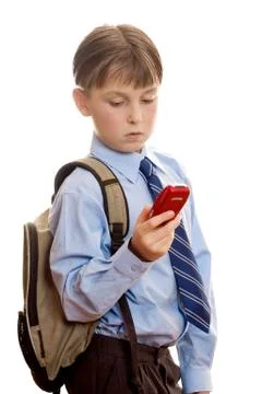 Boy using a mobile phone Stock Photos