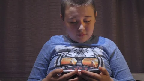 Boy using smartphone Video stock 73258895