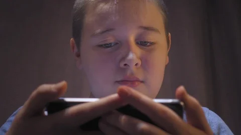 Boy using smartphone Stock Footage 73259059