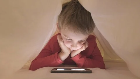 Boy using smartphone to video call a friend Stock-Footage 95448157