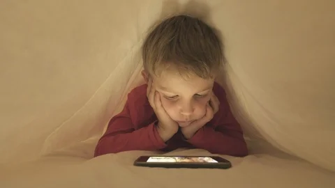 Boy using smartphone to video call a friend Stock-Footage 95448794