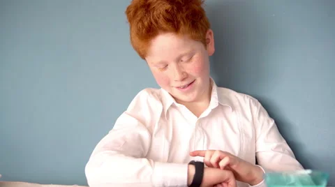 Boy using smartwatch Stock Footage 63294860