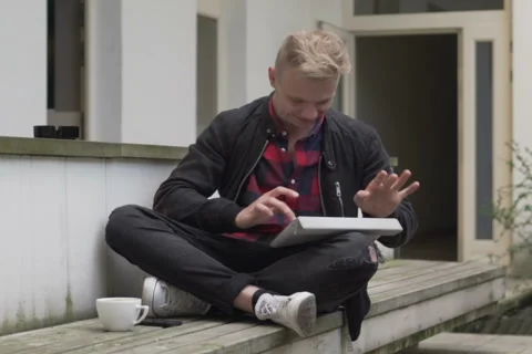 Boy using tablet and smiling to the camera Stock-Footage 50573804