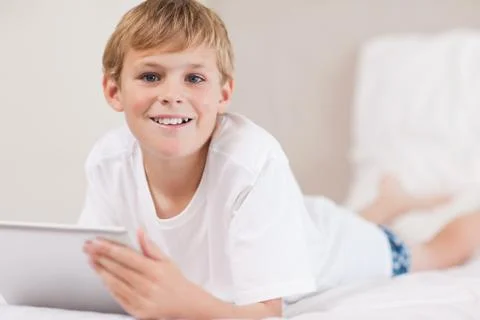 Boy using a tablet computer Stock Photos