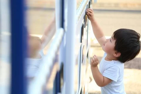 Boy using vending machine Stock Photos