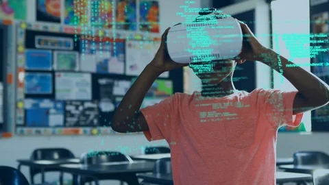 Boy using virtual goggles inside a classroom Stock Footage 107685966