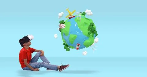 Boy using VR headset exploring virtual world with floating 3D globe Stock Photos