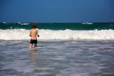 Boy v Ocean Stock Photos