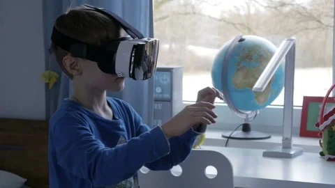 Boy in virtual reality glasses playing 360 degree game - 4k Stock Footage 80264744
