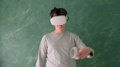 A boy in vr headset Stock Footage 252115546