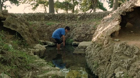 Boy Wades in Spring Water 스톡 동영상 53181079