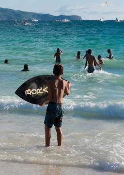 Boy with wake board Stock Photos