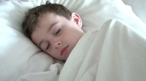 Boy Waking Up in Hotel 스톡 동영상 65745530