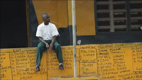 Boy on walk with flagpole at school Stock Footage 111037241
