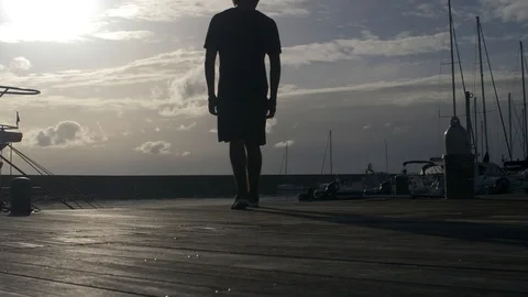 Boy walk inthe port Stock Footage
