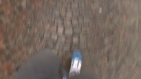 Boy Walking on Ancient Sidewalk Vídeo Stock 81063062