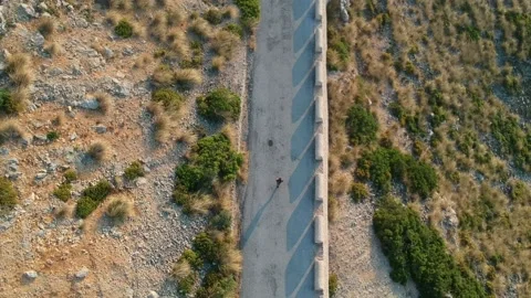 Boy walking down the road Stock Footage 130335794