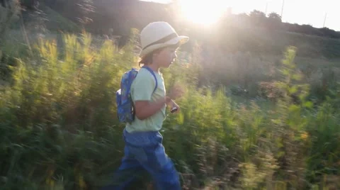 Boy walking in the forest Video stock 40984044