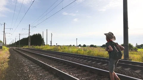 Boy Walking On Rails Stock Footage 79498302