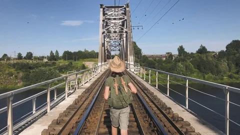 Boy Walking On Railway Bridge Stock Footage 79498474