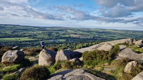 Boy walking on a rock with nature background in slow motion Stock Footage 276882468