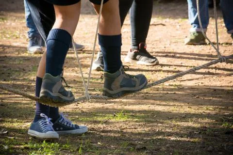 Boy walking on a rope Stock Photos