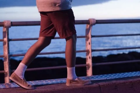 Boy Walking from the Side Stock Photos